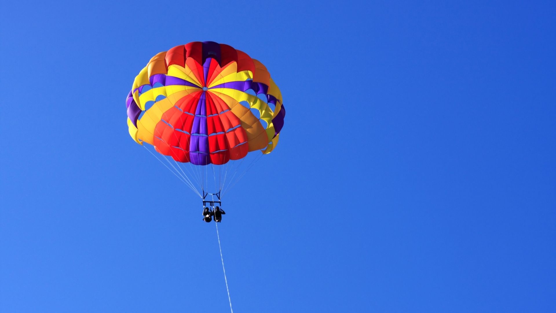Commercial parasail in use over the sea, trusted by professionals worldwide